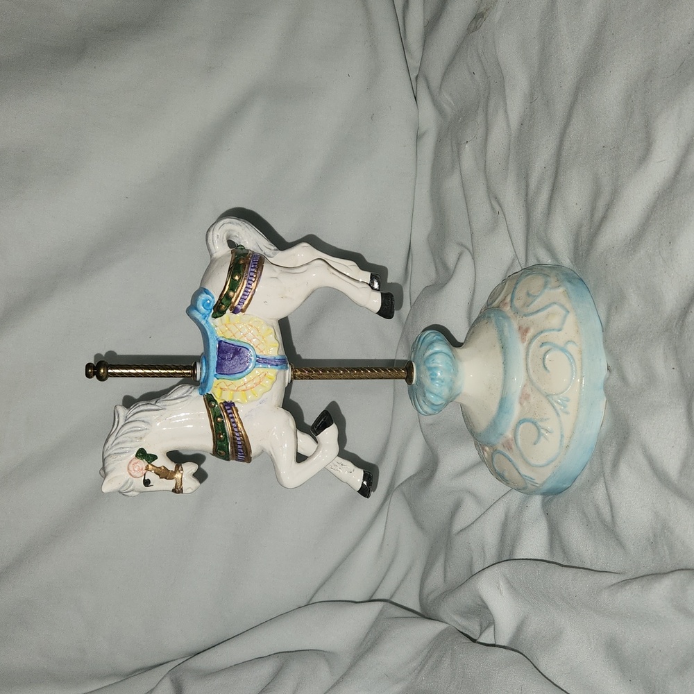 Musical carousel horse